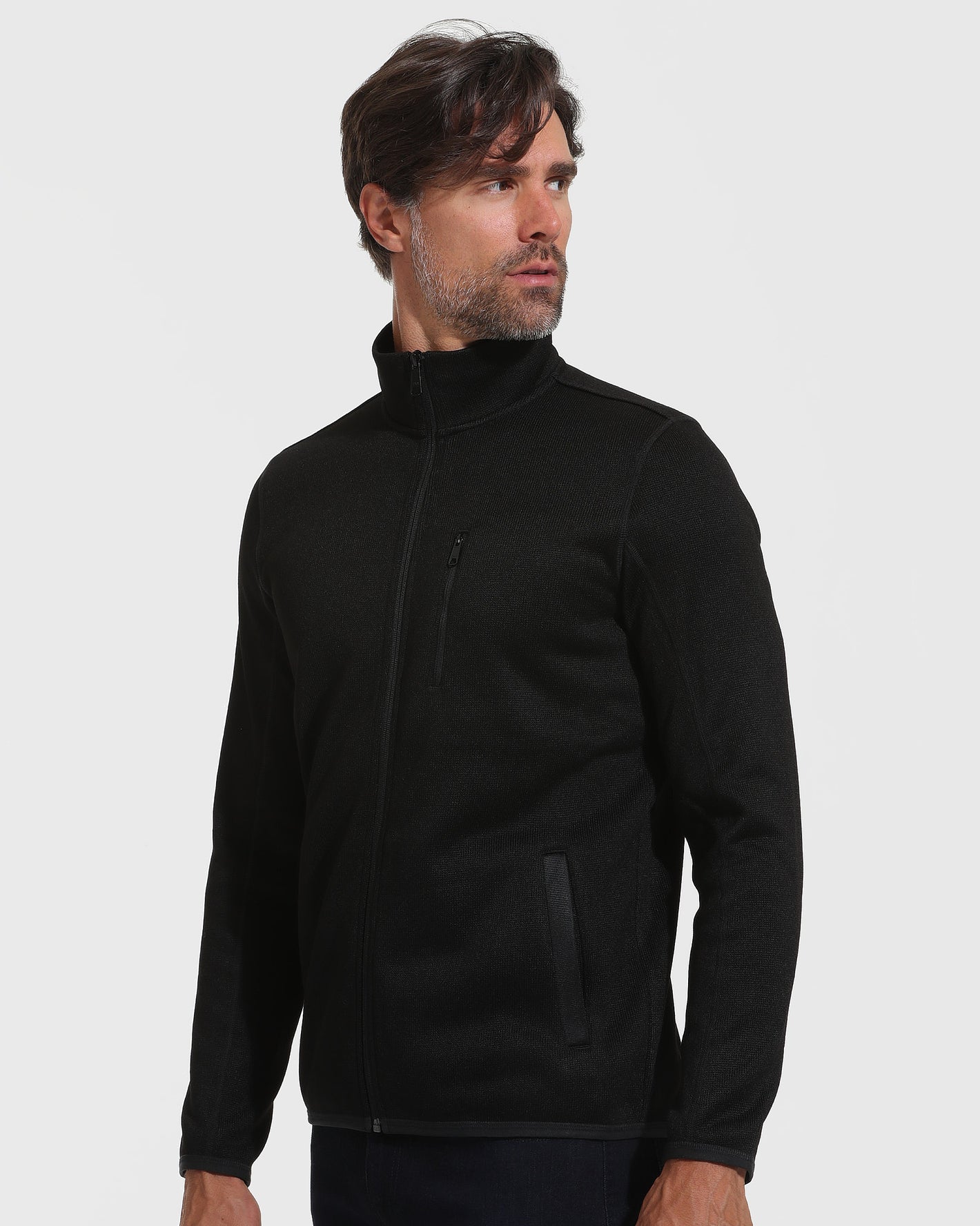 Black Sweater Fleece Jacket with zippered chest and hip pockets.