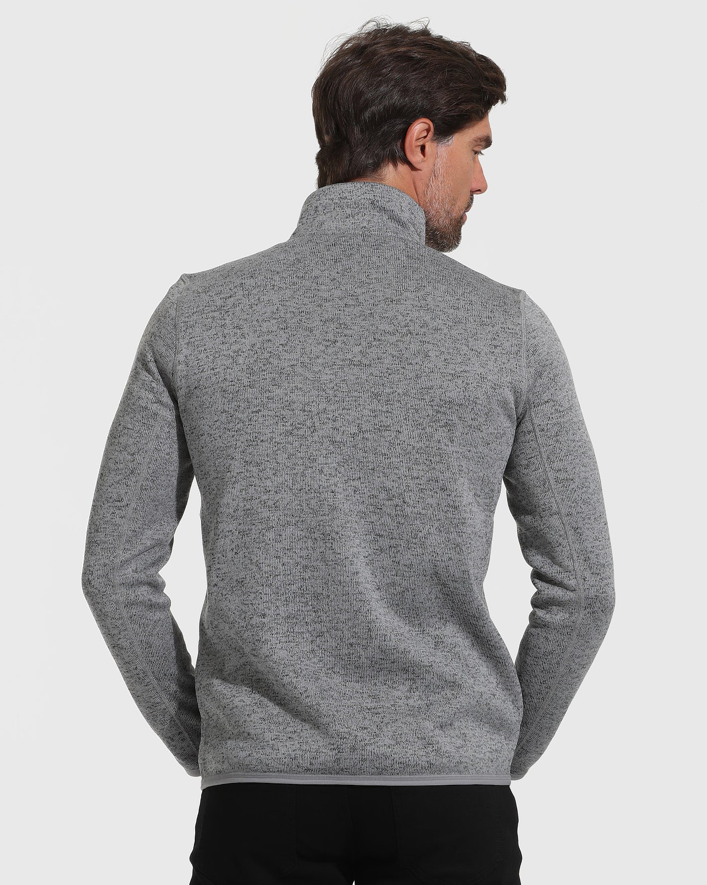Gray Sweater Fleece Jacket, back view, mock-neck, hands in pockets.