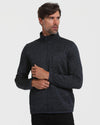 Man in Navy Sweater Fleece Jacket with zip pockets, looking right.