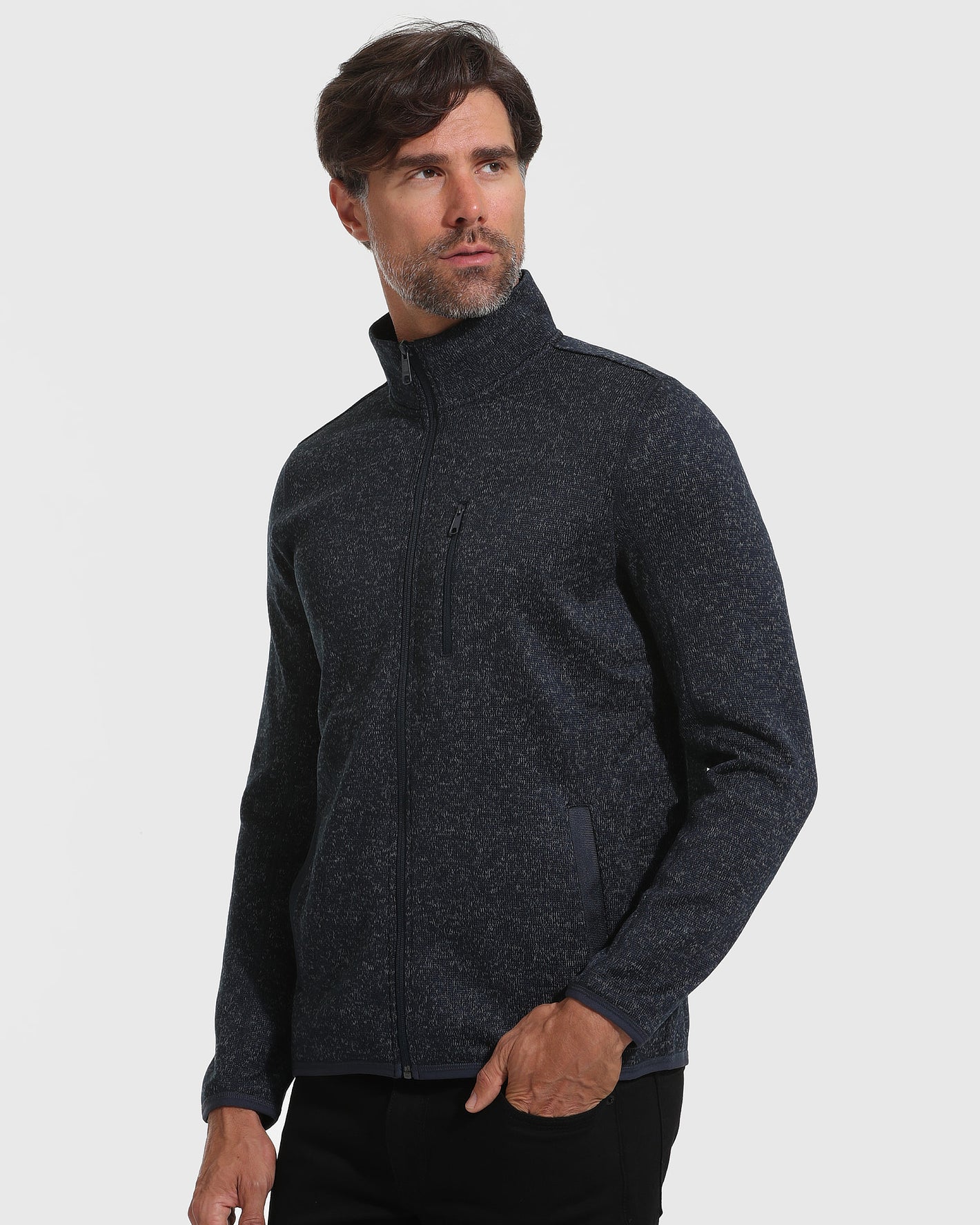 Navy Sweater Fleece Jacket with zip pockets, worn by a bearded man.