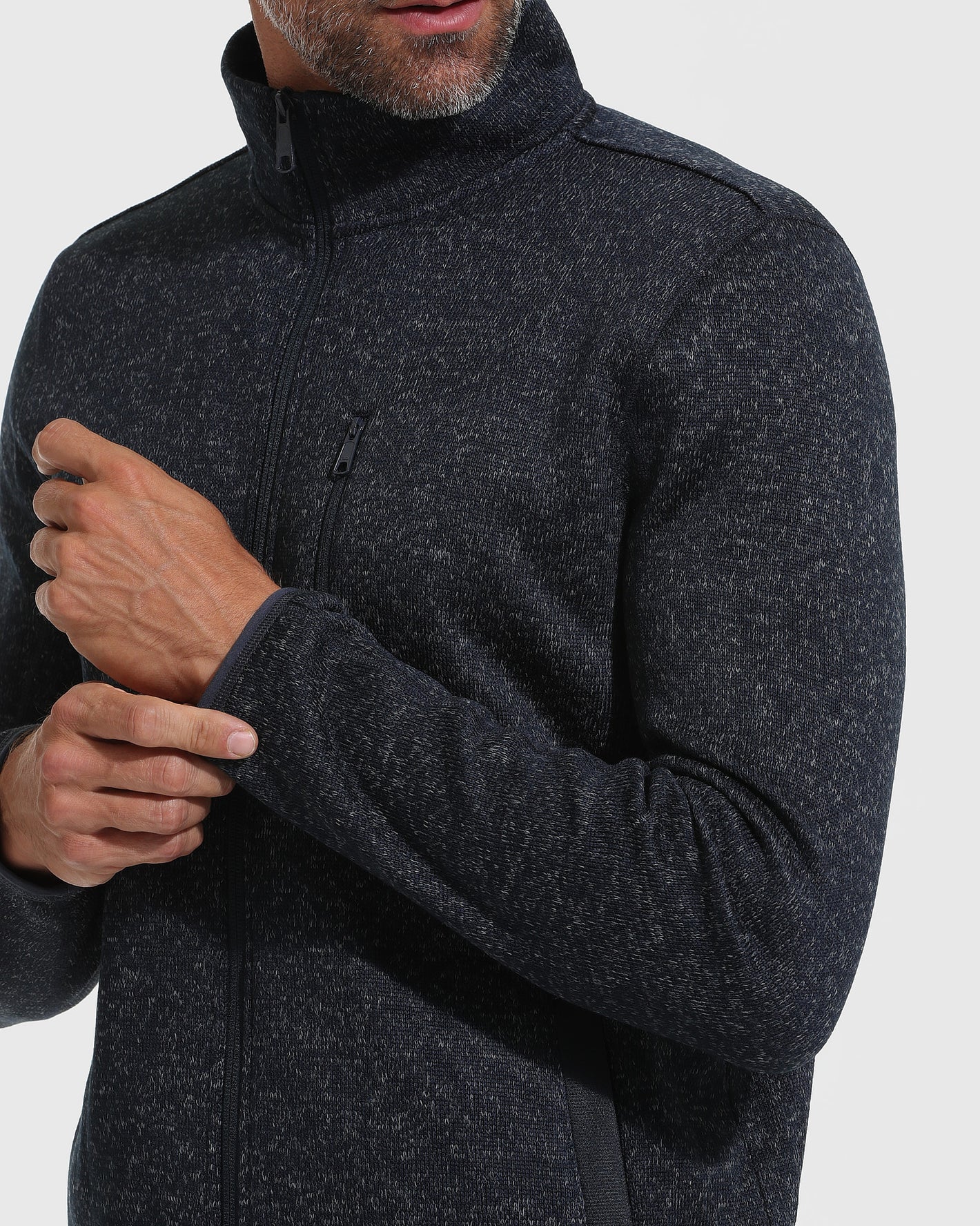 Navy Sweater Fleece Jacket with chest zip pocket, worn by model.