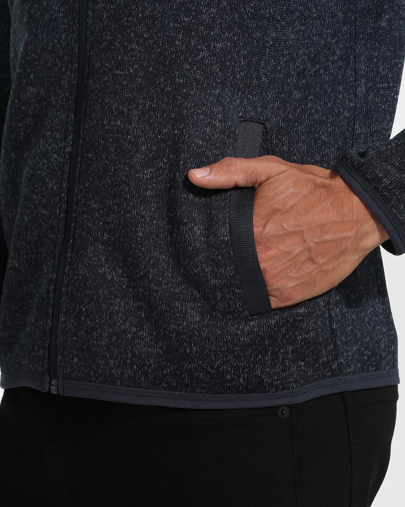 Navy Sweater Fleece Jacket with knit texture and zippered pockets.
