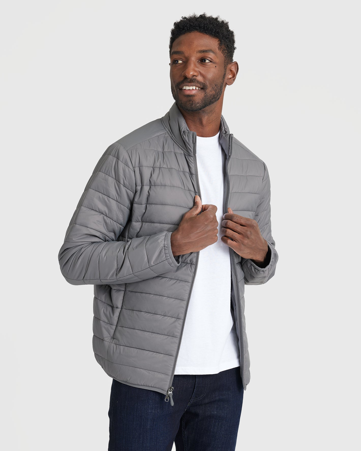 Gunmetal Puffer Jacket worn partially unzipped, showcasing fit and style.