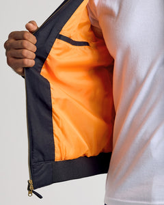 True ClassicBlack Bomber Jacket with orange lining and brass zipper.