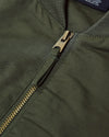 Army Green Bomber Jacket featuring brass-tone zipper and detailed collar stitching.