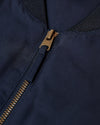 Navy Bomber Jacket with brass zipper and ribbed collar.