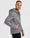 Gunmetal Hooded Puffer Jacket on young man, three-quarter side view.