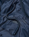 Navy Hooded Puffer Jacket with zipper, grommet, and braided drawstring.
