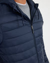 Navy Hooded Puffer Jacket with horizontal baffles and drawcord hood.