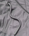 Gunmetal Hooded Puffer Jacket with quilted stitching and braided drawcord.