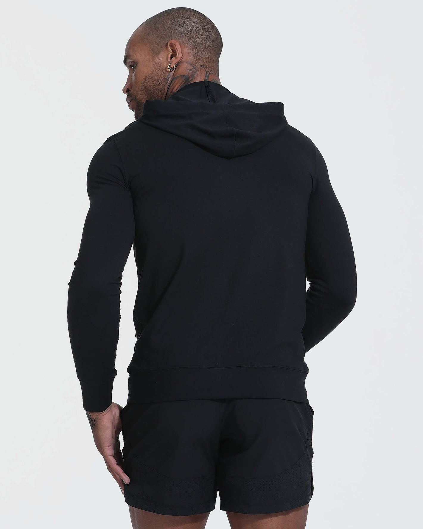 Black Active Comfort Full Zip Hoodie on model, showcasing slim fit.