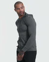 Model in Charcoal Heather Active Comfort Full Zip Hoodie, looking left.