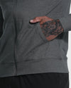 Charcoal Heather Active Comfort Full Zip Hoodie with tattooed hand in pocket.