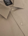 Khaki Coaches Jacket with snap buttons, pointed collar, label visible.