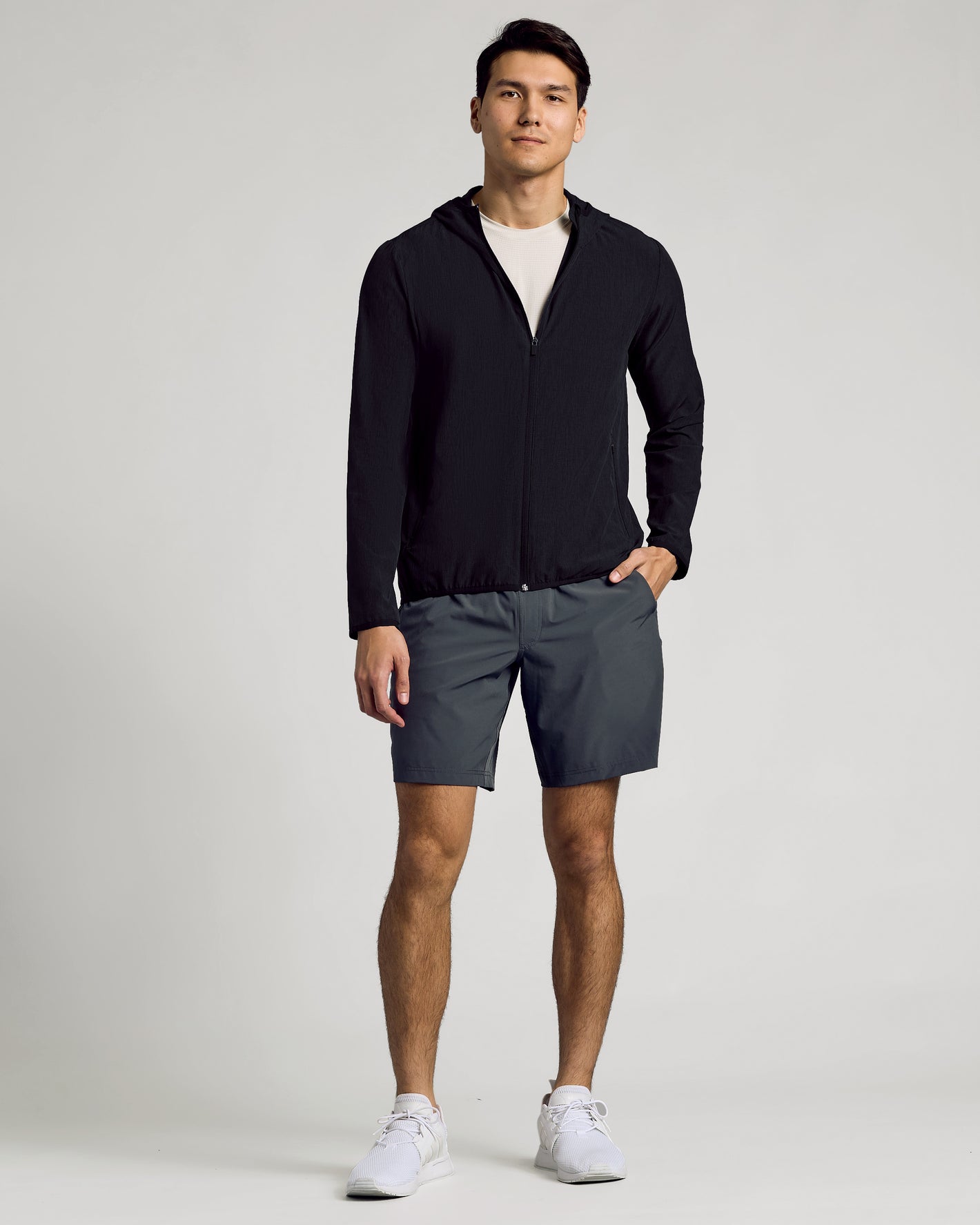 Model in Black Active Shell Jacket, showcasing athletic fit and design.