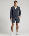 Young man models Charcoal Heather Gray Active Shell Jacket in athletic wear.