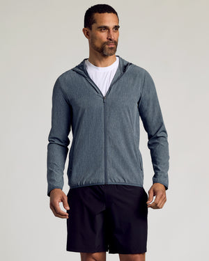 Heather Navy Active Shell Jacket with hood, zip pockets, and athletic shorts.