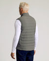 Carbon Puffer Vest, back view on model; snug fit, sleek design.