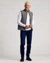 Carbon Puffer Vest on middle-aged man, modern casual style.