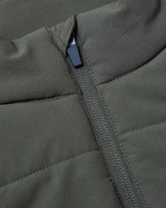 True ClassicCarbon Puffer Vest with quilted stitching and central zipper.