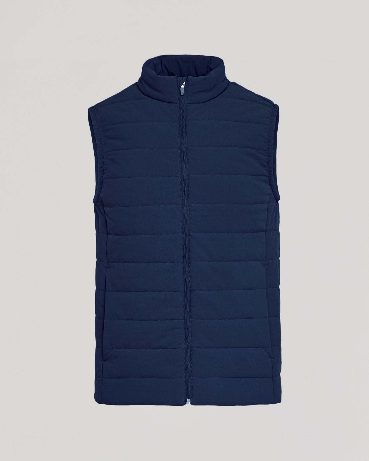 Navy Puffer Vest with zipper and fleece-lined pockets.