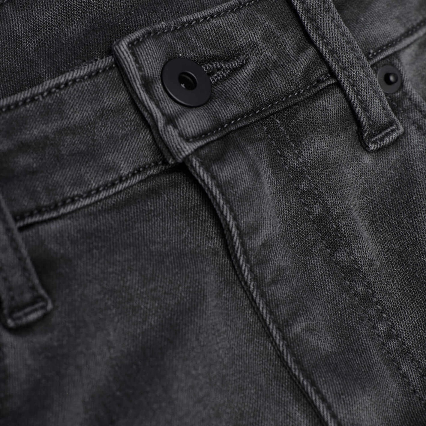 Gray Wash Slim Comfort Stretch Jeans waistband with belt loops and matte-black button.