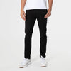 Staple Slim Comfort Knit Chino Pant on model with white sneakers.