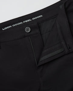 True ClassicBlack & Navy Slim Comfort Knit Chino Pant 2-Pack, partially opened zip and button.
