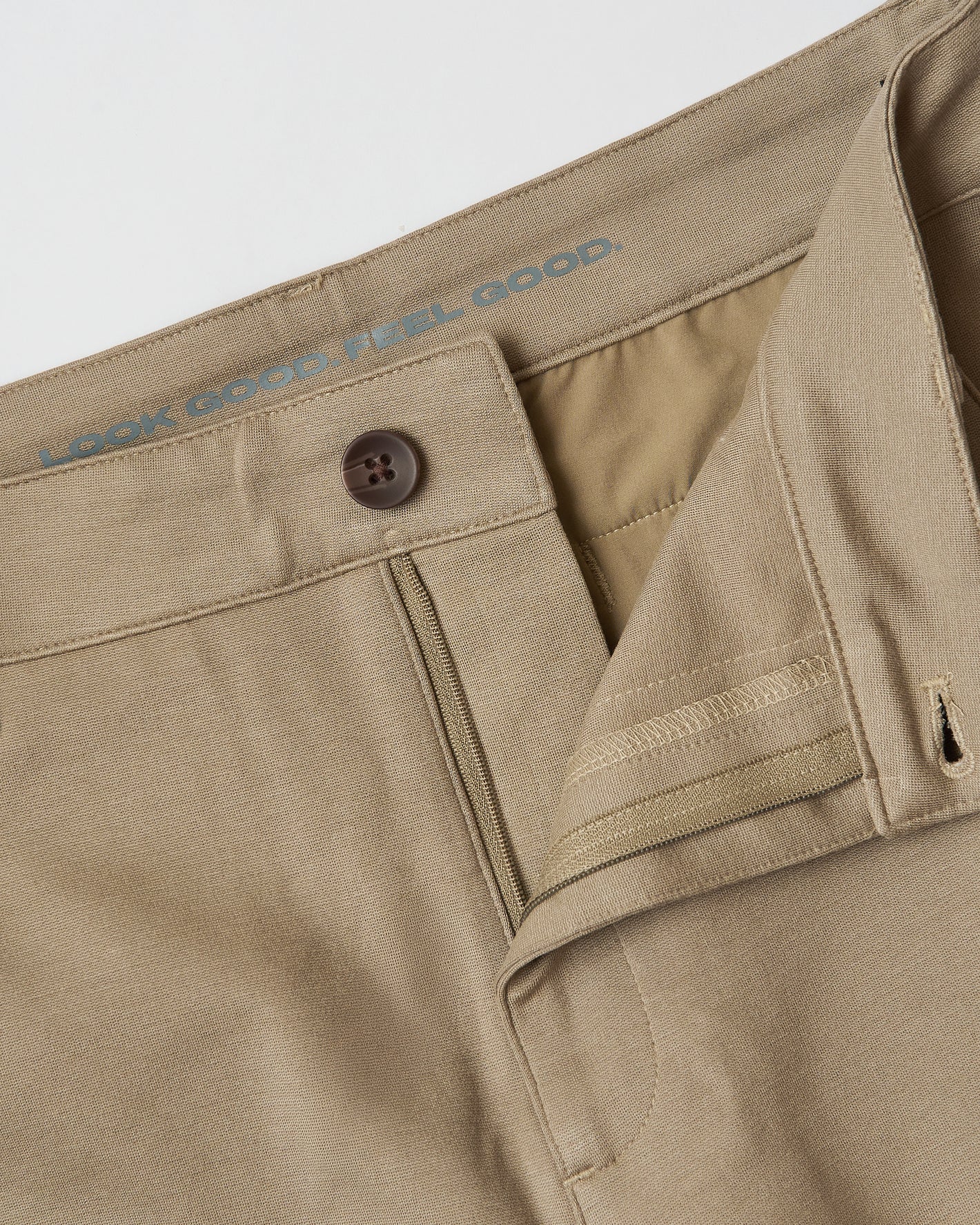 Slim Comfort Knit Chino Pant 3-Pack waistband with button and slogan detail.
