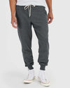 Charcoal Heather Gray Fleece French Terry Joggers with white sneakers.