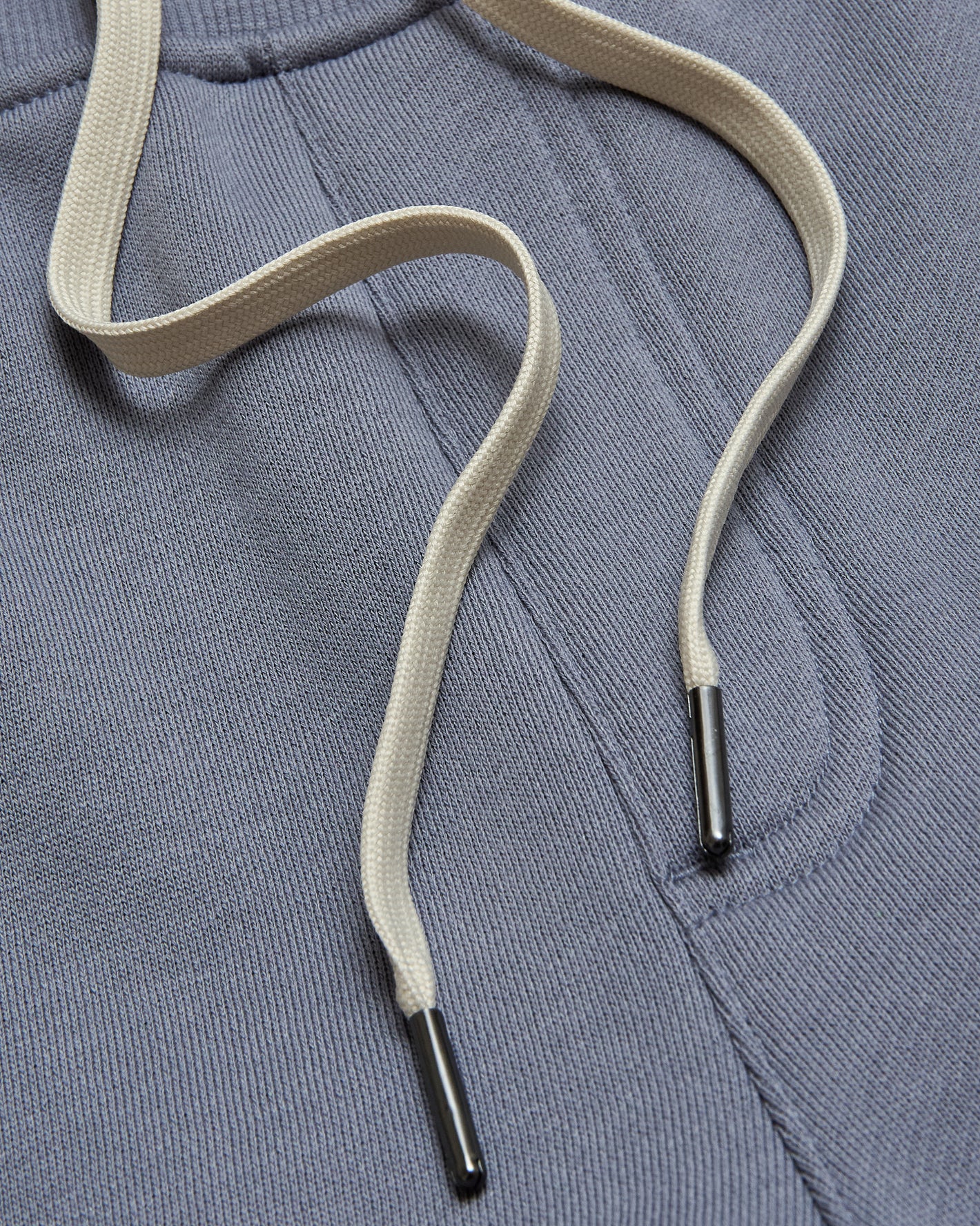 Dusty Blue Fleece French Terry Joggers with off-white drawcords.