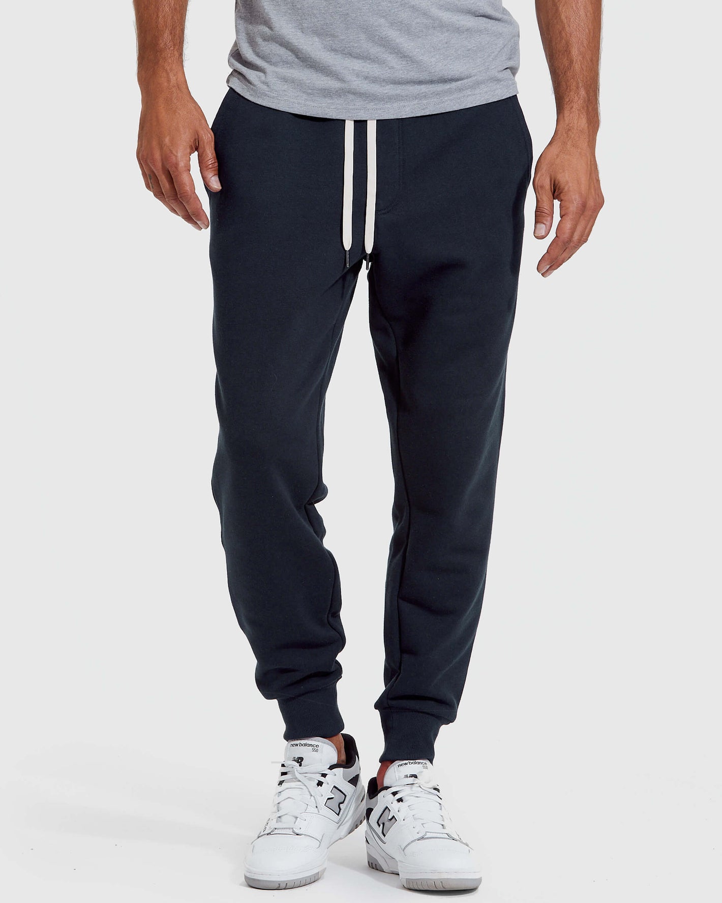 Navy Pullover Fleece Crew & Jogger 2-Pack with New Balance sneakers.