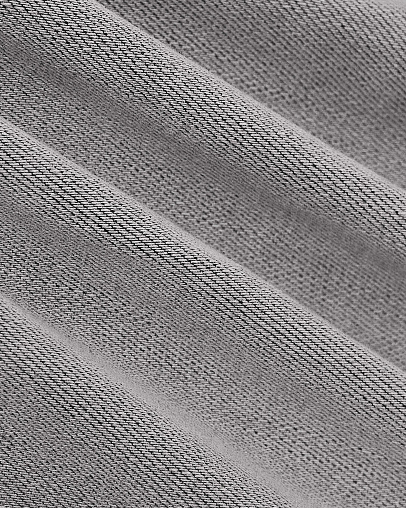 Comfort Denim fabric close-up showing diagonal twill texture.