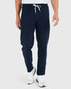 Heather Navy Active Comfort Straight Leg Pant with white drawstring and sneakers.