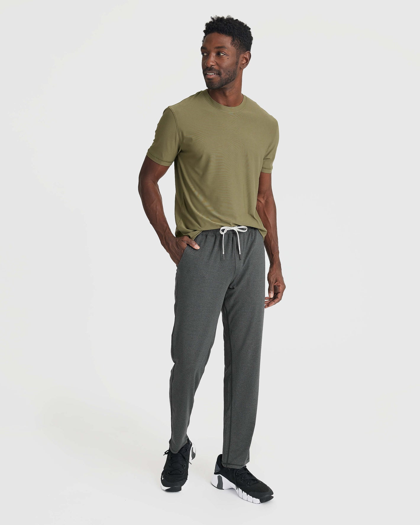 Model wearing Charcoal Heather Active Comfort Straight Leg Pant with black sneakers.