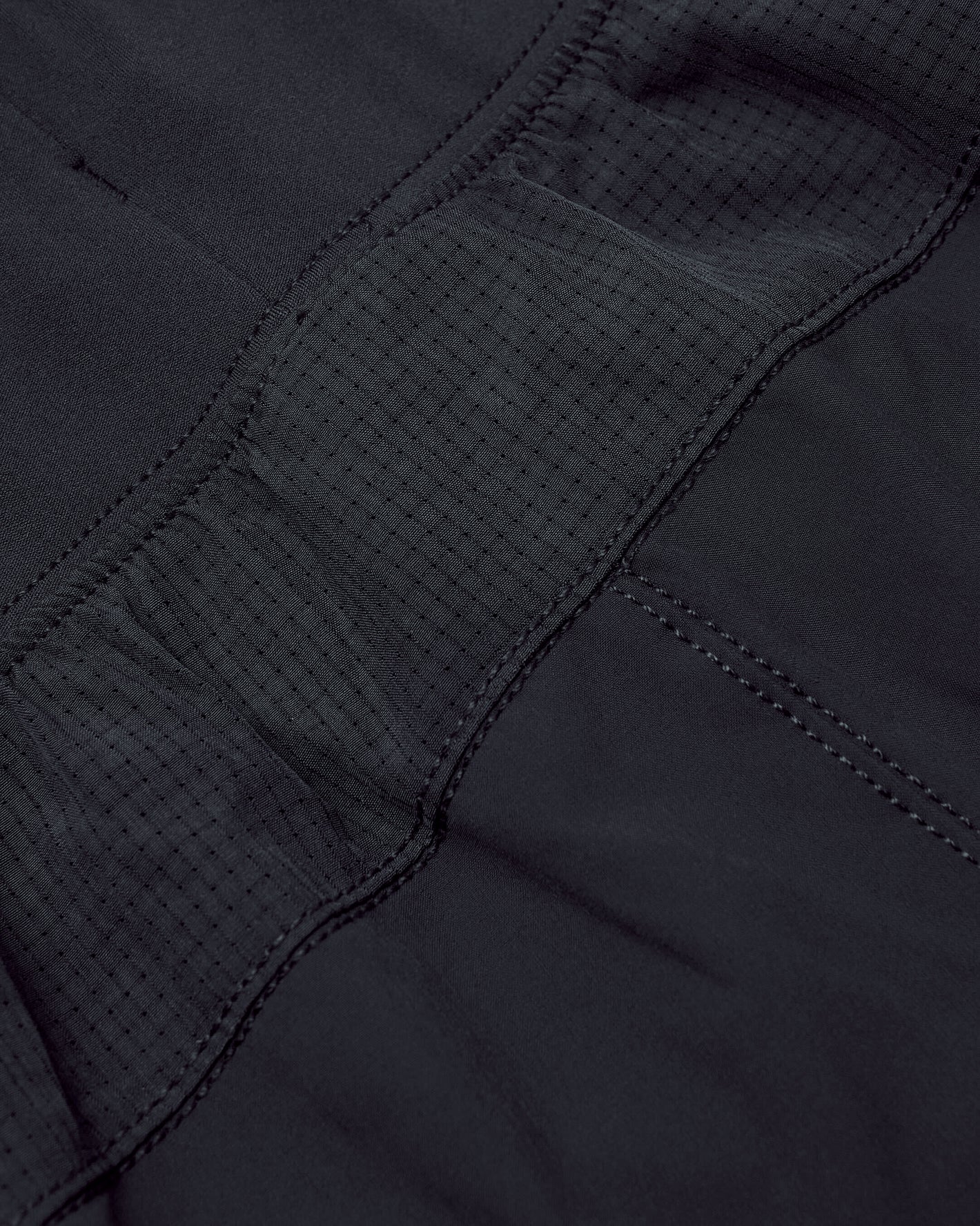 Black Active Training Joggers detail, featuring textured elastic and precise stitching.