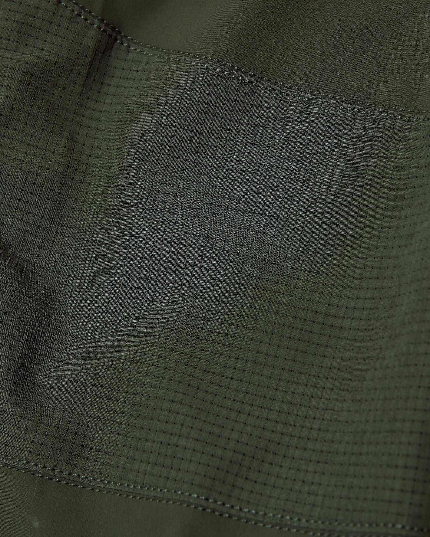 Kelp Active Training Joggers' olive-green ripstop fabric with stitching detail.