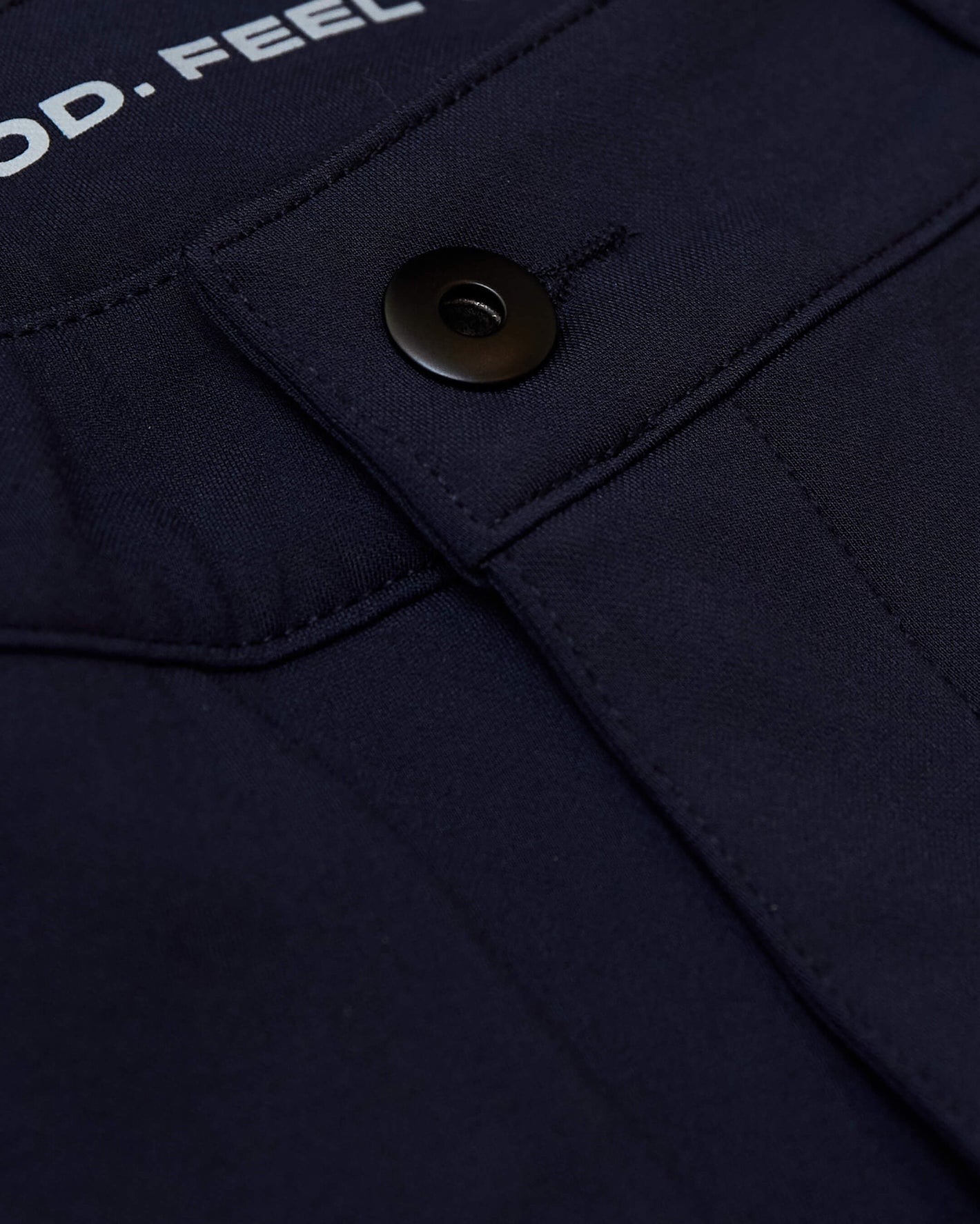 Navy Commuter Pants with flap pocket and OD.FEEL. waistband detail.