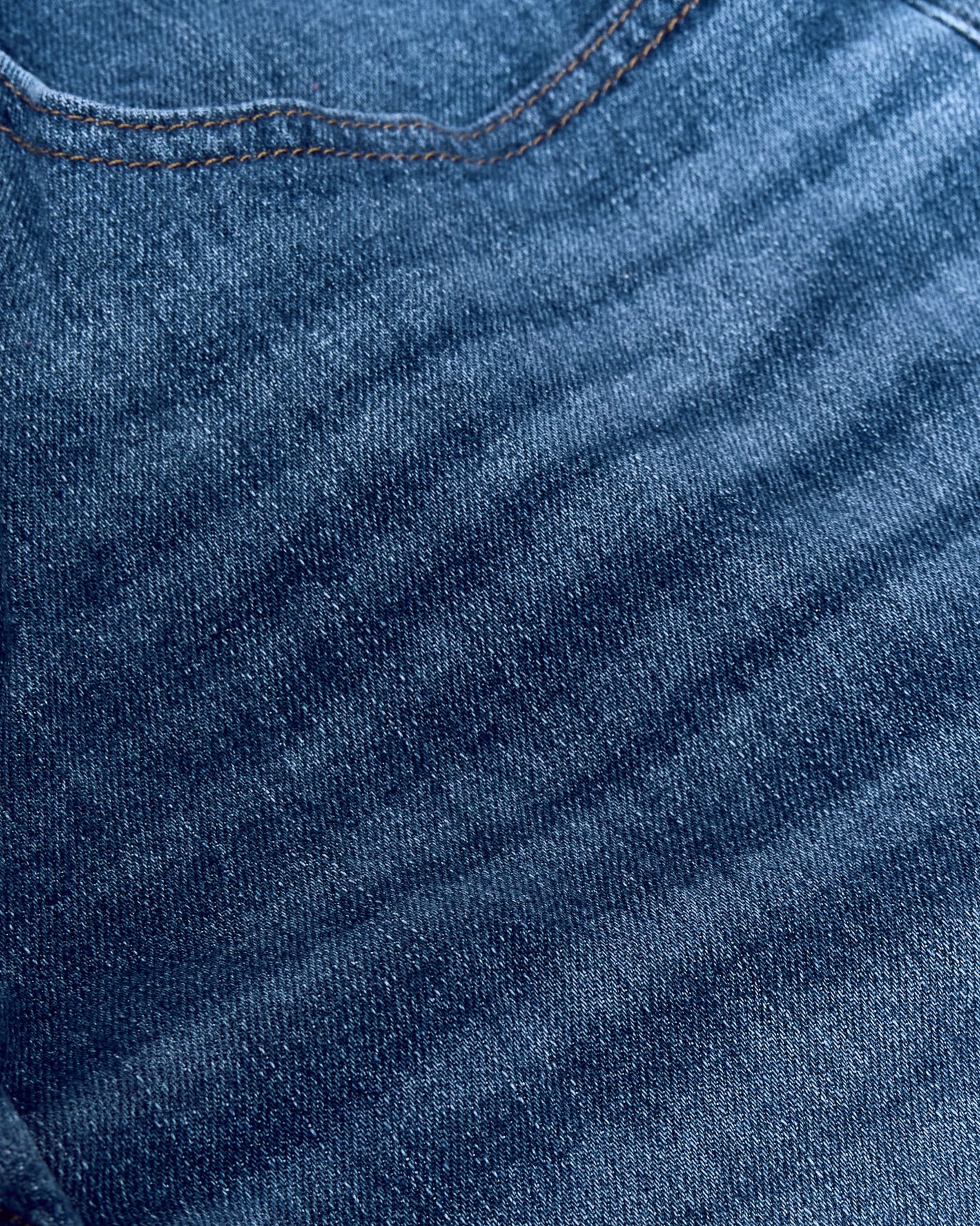 Medium Indigo Wash Slim Authentic Denim Jeans, close-up of pocket stitching.