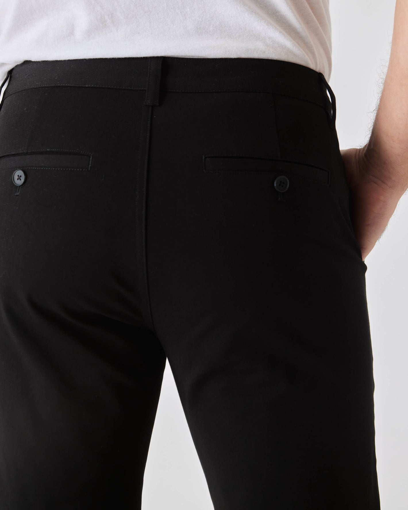 Black Slim Twill Chino Pant with belt loops and buttoned welt pockets.