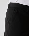 Black Slim Twill Chino Pant with belt loops and zippered side pocket.