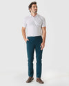 Centurion Slim Twill Chino Pant, worn with white polo, brown sneakers.