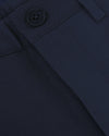 Navy Slim Twill Chino Pant close-up: fabric, stitching, button details.