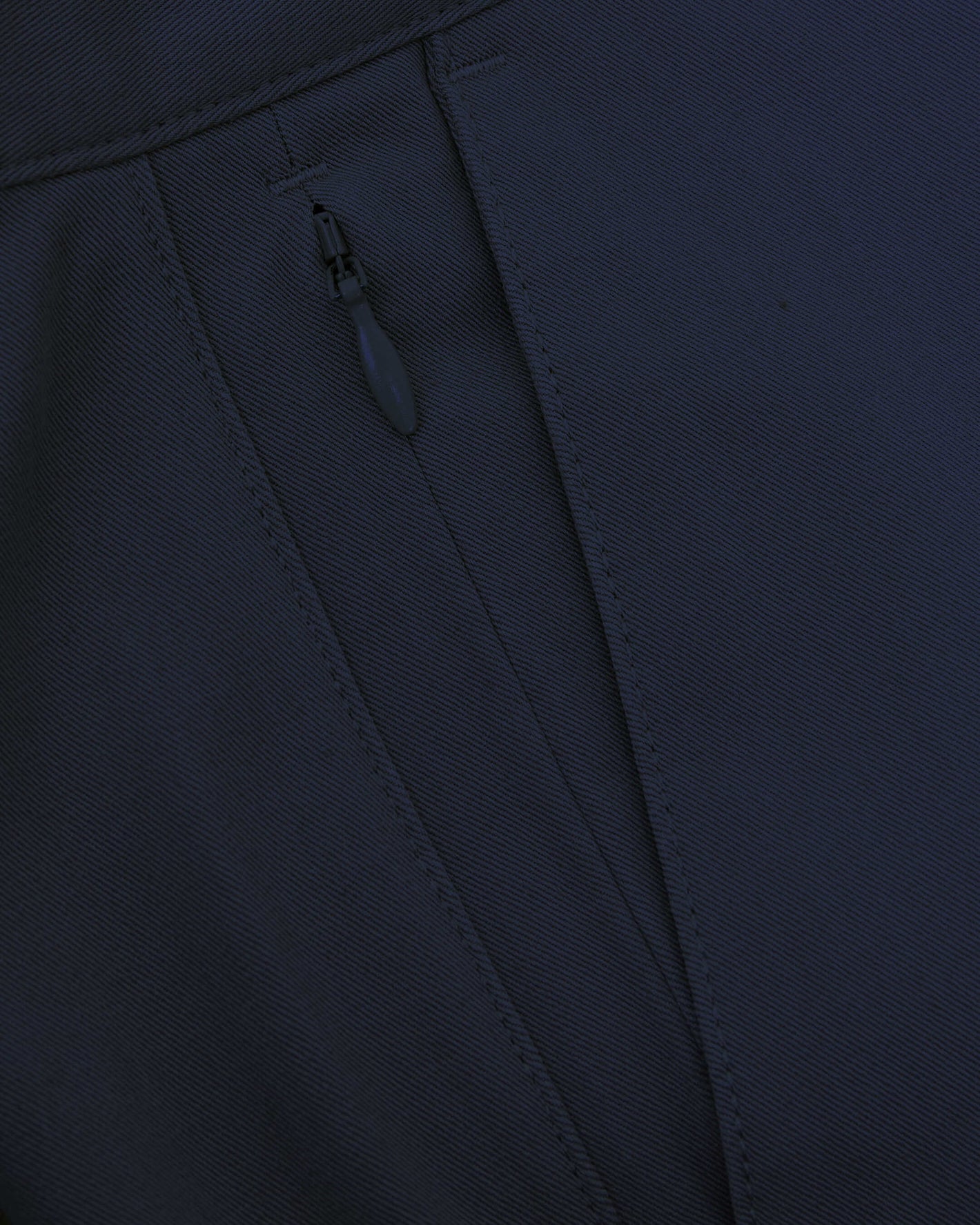 Navy Slim Twill Chino Pant fabric with zippered pocket detail.