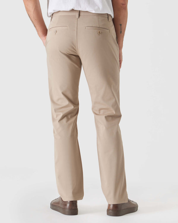 Khaki Straight Twill Chino Pant with brown slip-on sneakers, rear view.