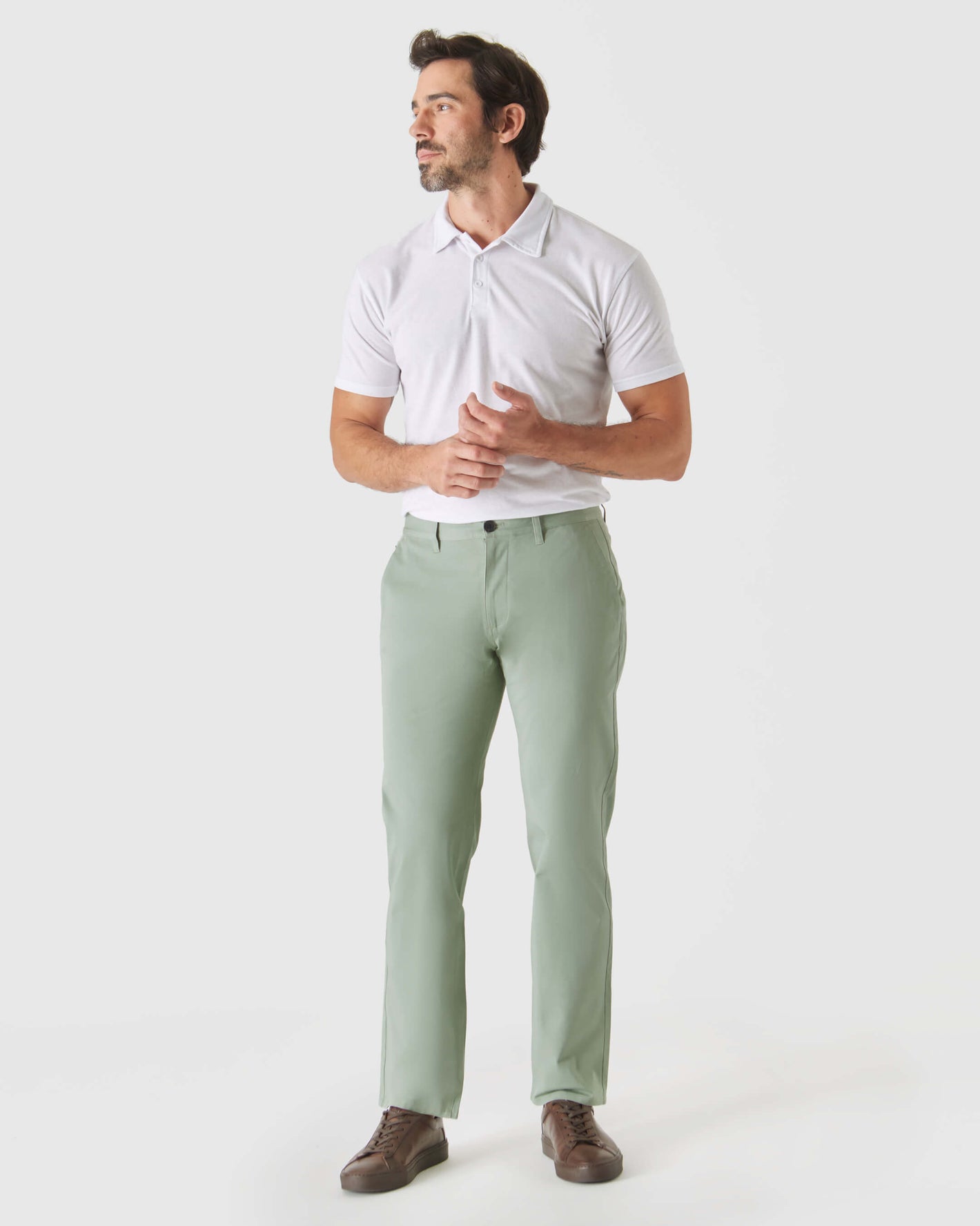 Man wearing Meadow Straight Twill Chino Pant, showcasing its relaxed fit.