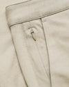 Sandstone Straight Chino Pants 2.0 showing waistband and zip pocket detail.