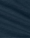 Close-up of Womens Navy Waffle Long Sleeve Henley & Waffle Leg Pant knit fabric.