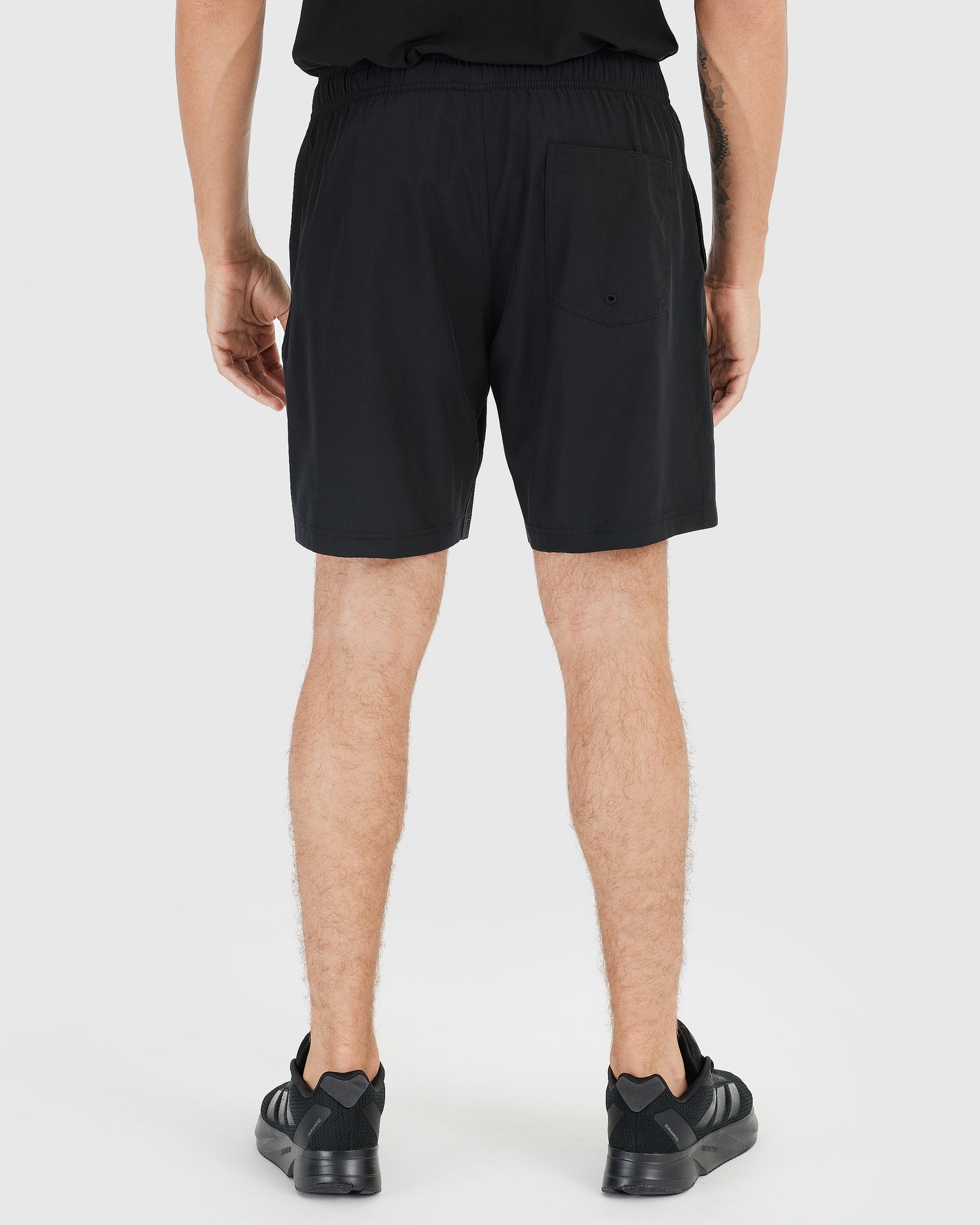 Back view of 7 All Black Active Quick Dry Shorts.