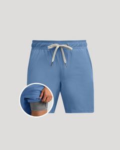 True ClassicBlue shorts with a drawstring on a gray background